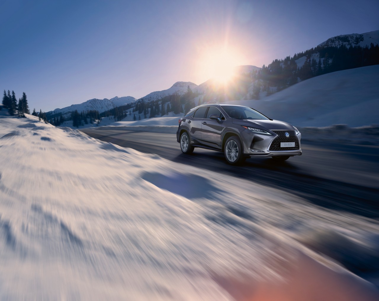 Lexus RX 450h driving in a mountainous environment 